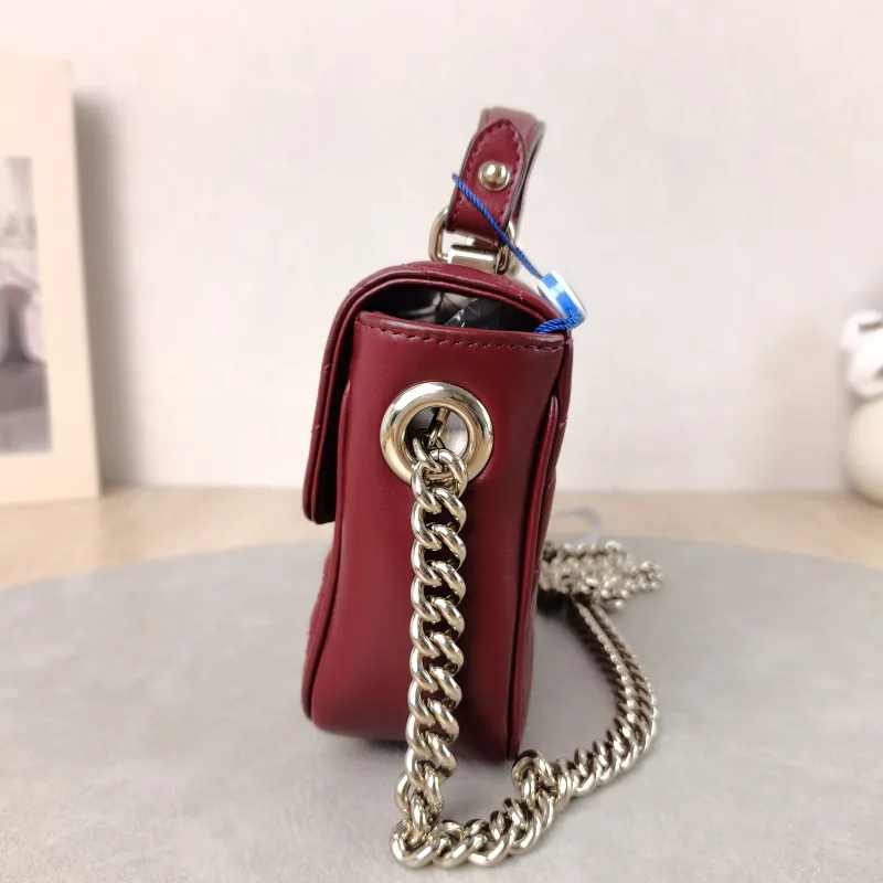 GUCCI Crossbody Bag GG Marmont Marmont Edition Calfskin Mini 17 × 6 × 13 cm — detail view 9 of 15