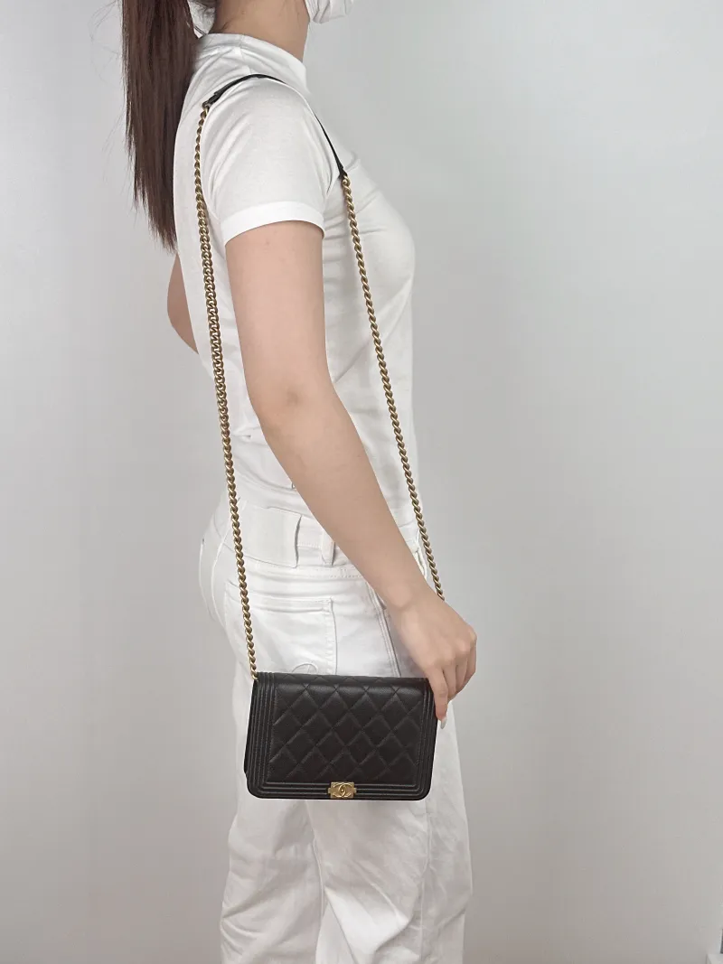 Chanel Crossbody Bag Le Boy​ WOC Black Grained Calfskinmini19.2 × 3.5 × 12.3 cm — on-model view 1 of 2
