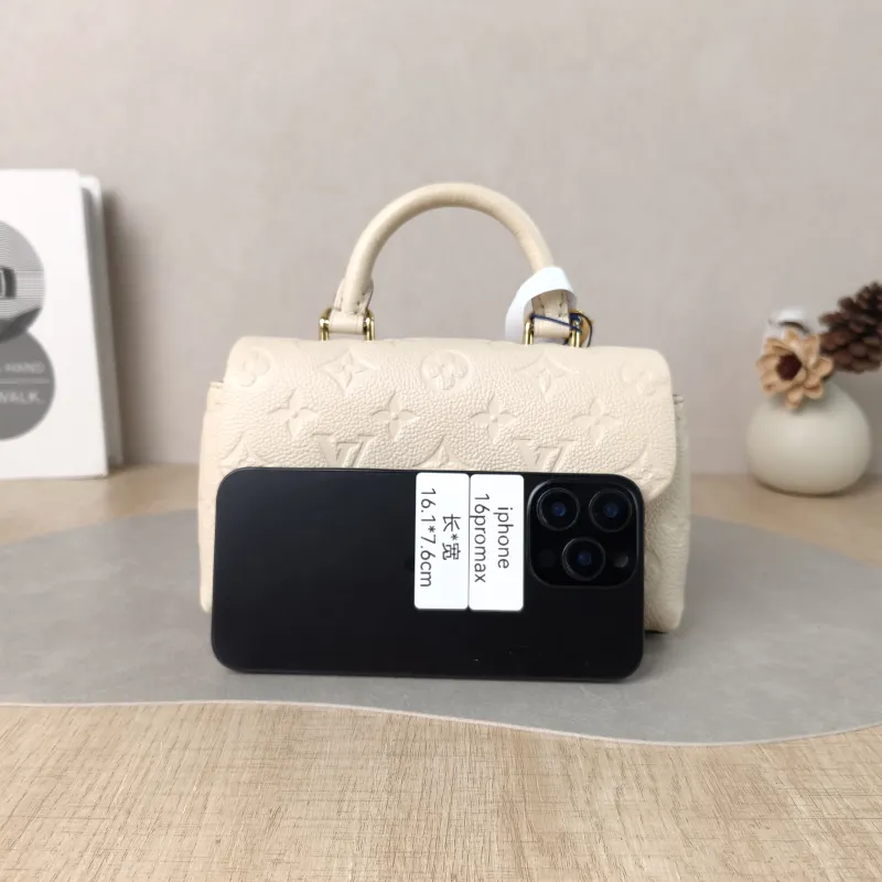 Louis Vuitton Crossbody Bag MADELEINE White Empreinte Embossed Calfskin nano 21 × 6 × 12.5 cm — cover view 2 of 6