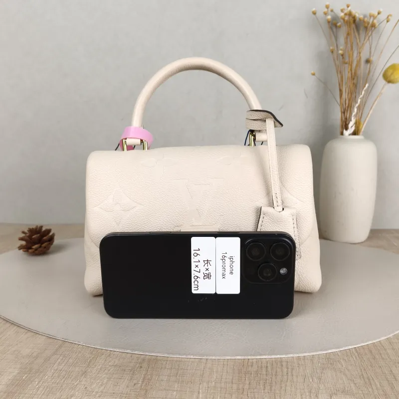 Louis Vuitton Crossbody Bag MADELEINE White Monogram Empreinte Embossed Calfskin BB 24 × 8.5 × 17 cm — cover view 2 of 5