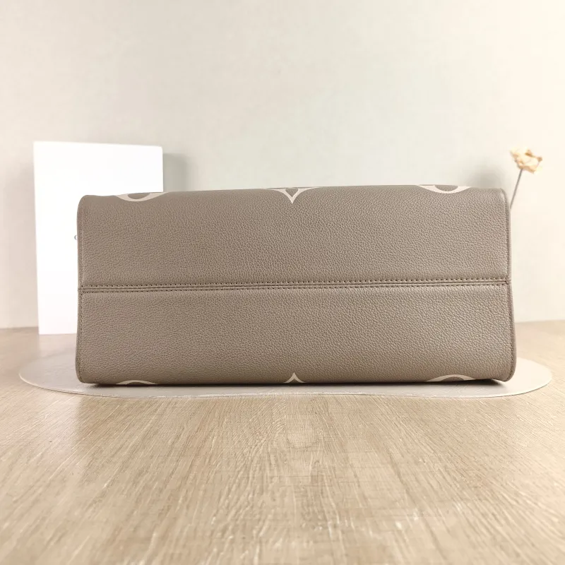 Louis Vuitton Shoulder Bag Onthego Medium · White Monogram Empreinte Embossed Calfskin Medium 35 × 14 × 27 cm — cover view 2 of 5