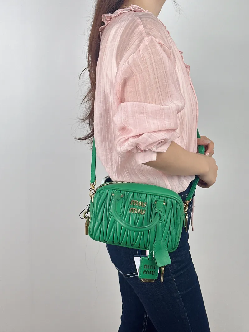 Miumiu Top Handle Bag Arcadie MatelasséCollection Edition Green Lambskin Small 19 × 6 × 13 cm — on-model view 1 of 2