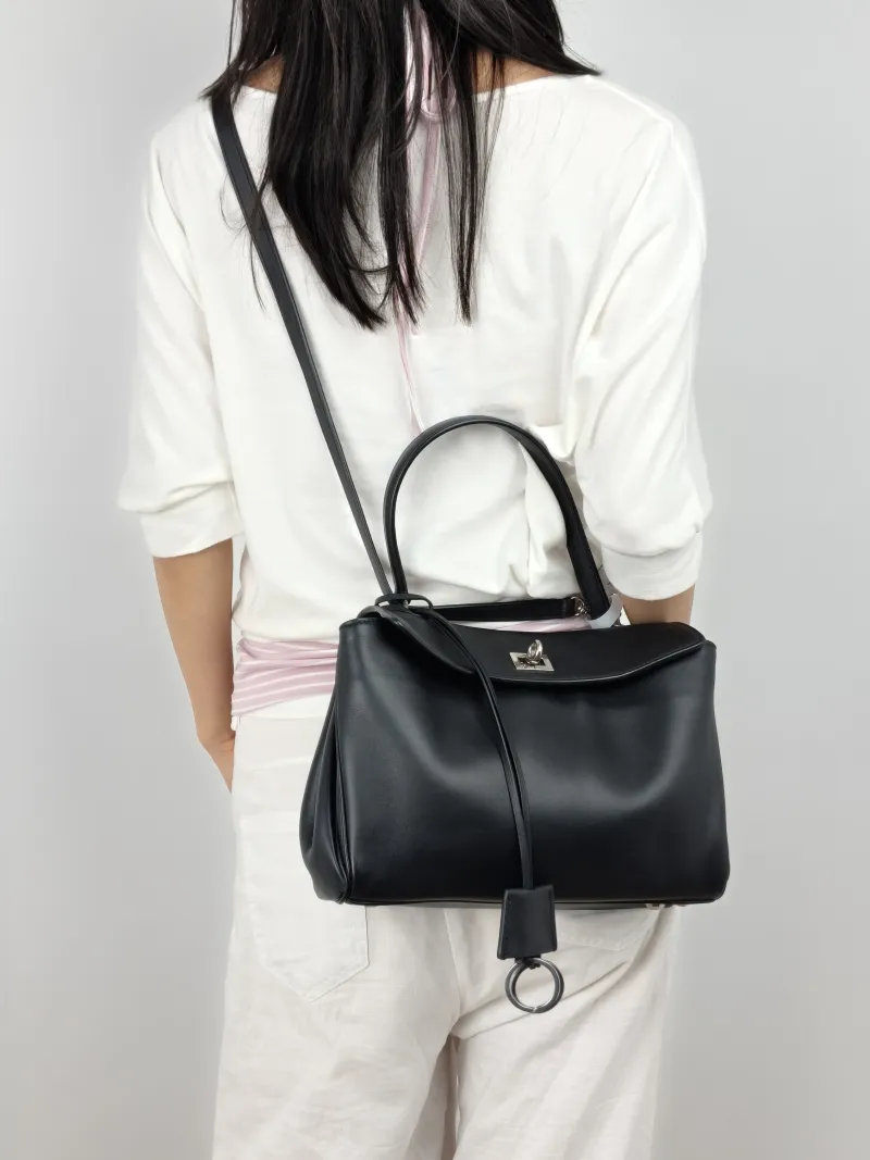 BALENCIAGA Crossbody Bag RODEO Black Calfskin Small 27 × 10 × 20 cm — on-model view 3 of 3