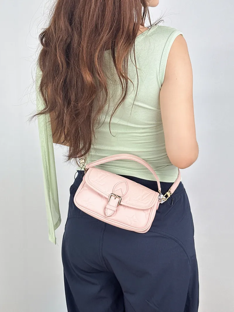 Louis Vuitton Crossbody Bag Diane Baguette Bag Empreinte Embossed Calfskin Monogramnano19 × 6 × 10.5 cm — on-model view 2 of 2
