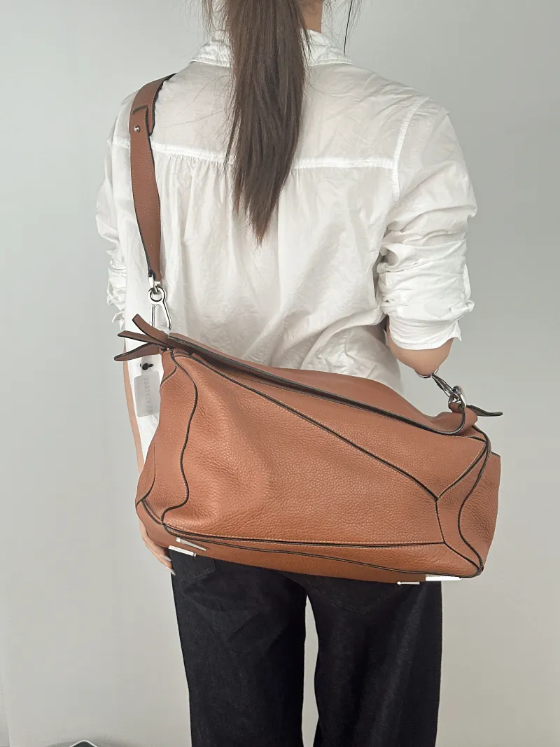 LOEWE Crossbody Bag Puzzle Brown Calfskin Large36 × 20 × 22 cm — on-model view 1 of 2