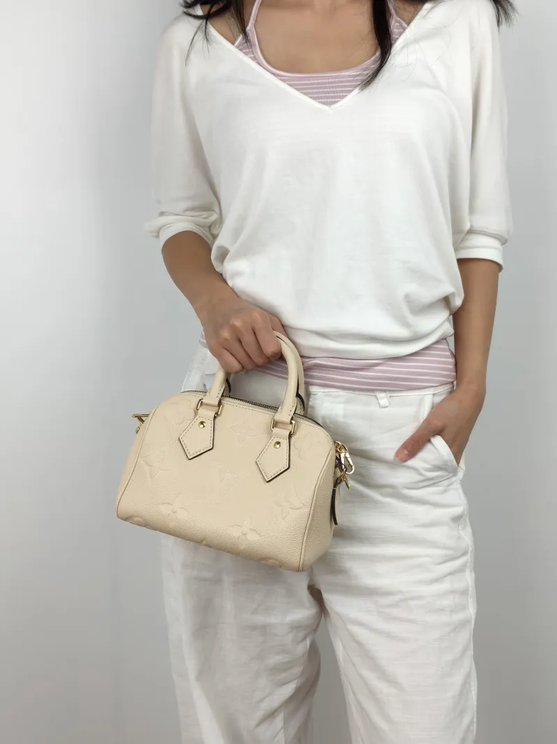Louis Vuitton Crossbody Bag Speedy20 White Empreinte Embossed Calfskin Small20.5 × 12 × 13.5 cm — on-model view 2 of 3