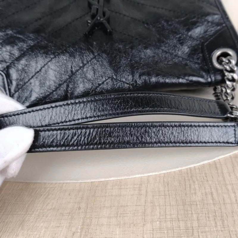 SAINT LAURENT Crossbody Bag Niki Black Waxed Leather Calfskin Medium 28 × 8.5 × 20 cm — detail view 12 of 14