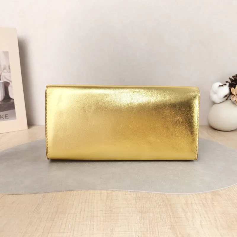 SAINT LAURENT Clutch Clutch Gold Calfskin 27 × 4 × 13 cm — cover view 4 of 5