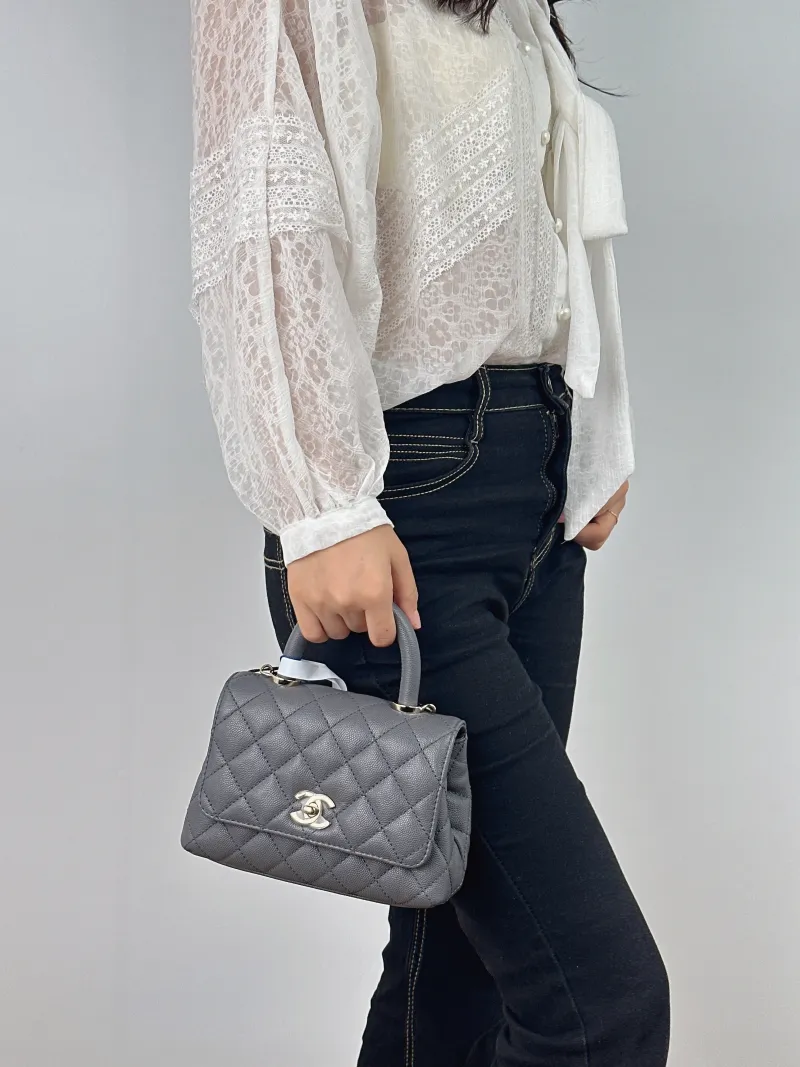 Chanel Crossbody Bag Coco Handle​ Dark Grey Grained Calfskin Mini 19 × 9 × 13 cm — on-model view 2 of 2