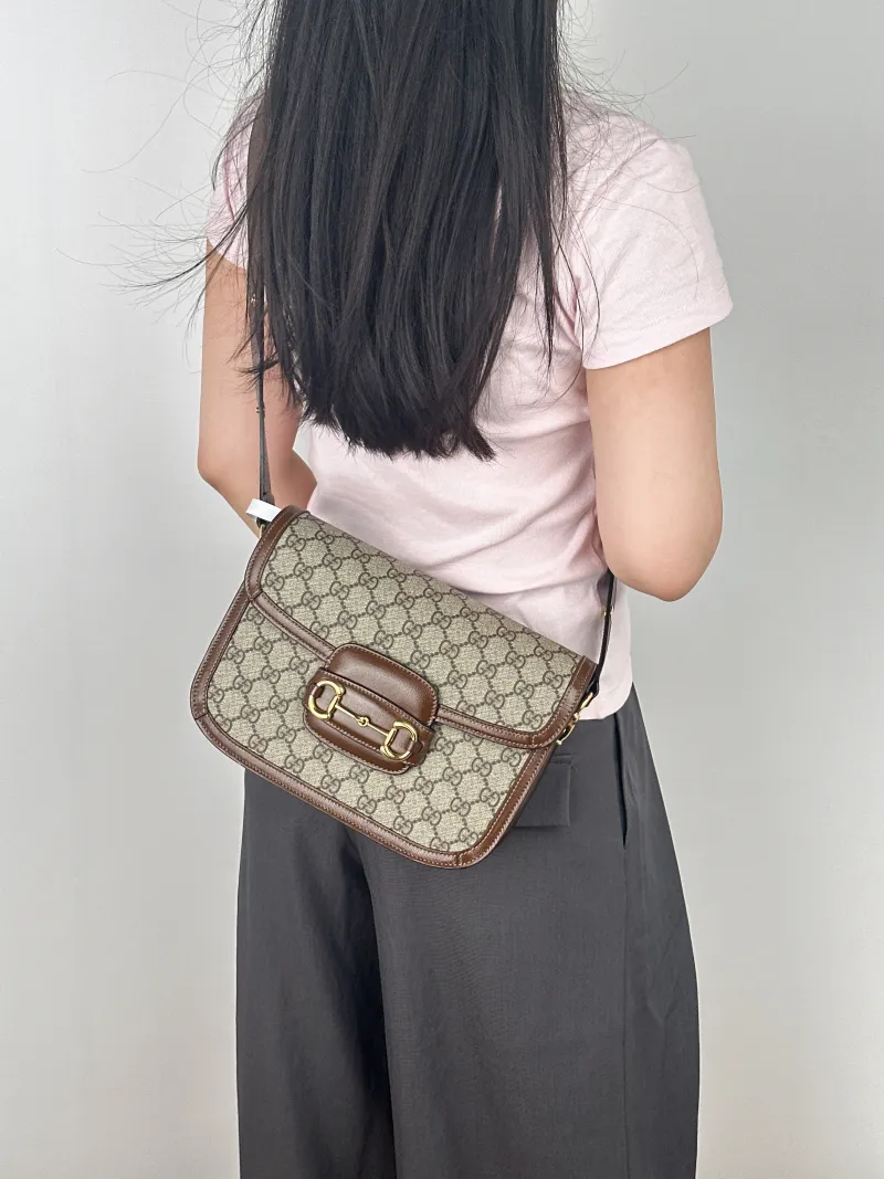 GUCCI Shoulder Bag Horsebit 1955 Horsebit Medium Monogram PVC Medium25 × 8 × 18 cm — on-model view 1 of 2