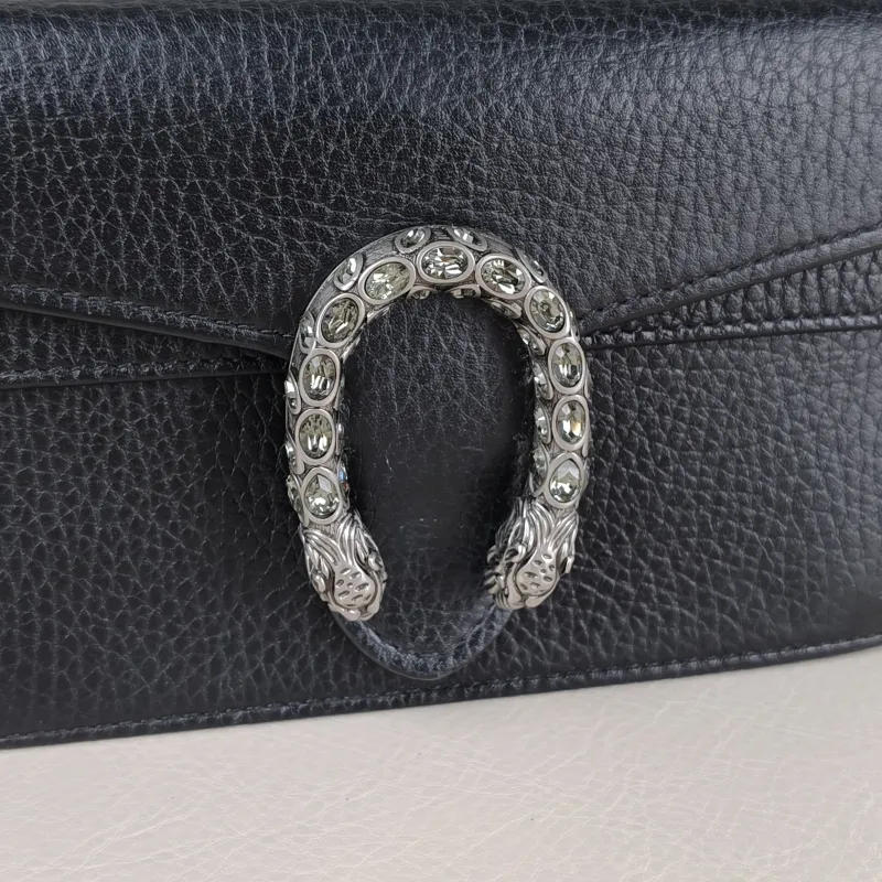 GUCCI Crossbody Bag Dionysus Black Calfskin Mini 16.5 × 4.5 × 10 cm — detail view 7 of 13