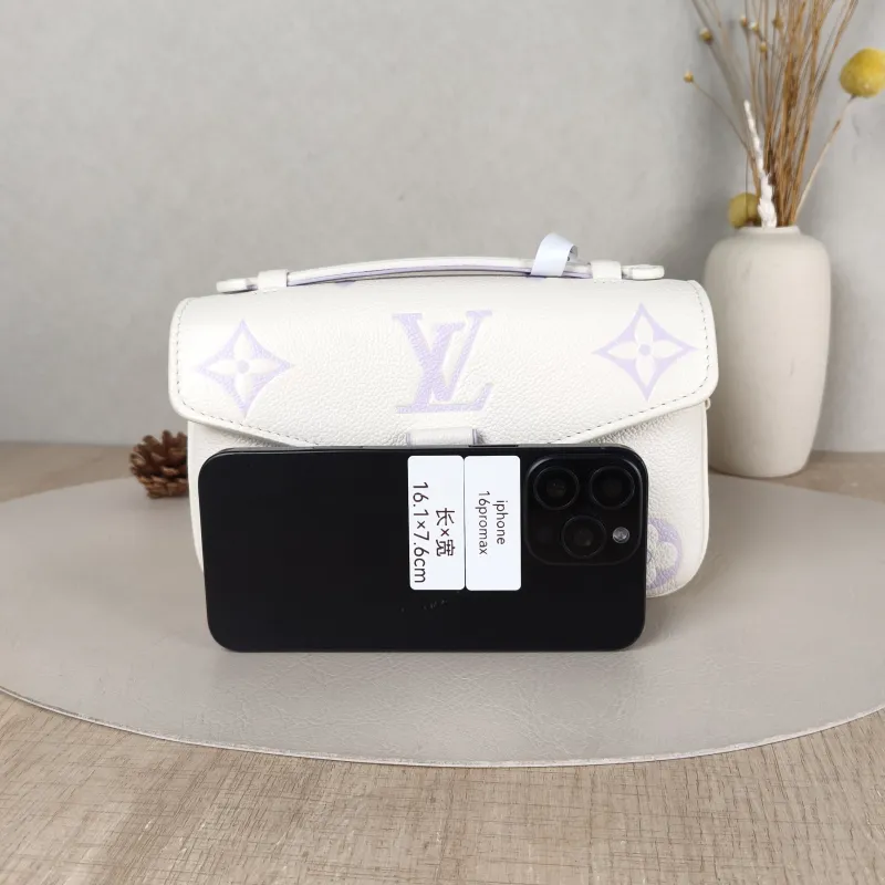Louis Vuitton Crossbody Bag Pochette Métis East West White · Monogram Empreinte Embossed Calfskin Small 21.5 × 6 × 13.5 cm — cover view 3 of 5