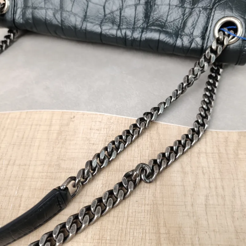 SAINT LAURENT Crossbody Bag Niki D Green Calfskin Medium 28 × 8.5 × 20 cm — detail view 10 of 11