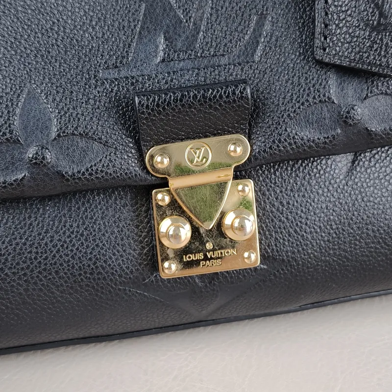 Louis Vuitton Crossbody Bag MADELEINE Black Monogram Empreinte Embossed Calfskin Medium 30 × 11 × 19.5 cm — detail view 1 of 13