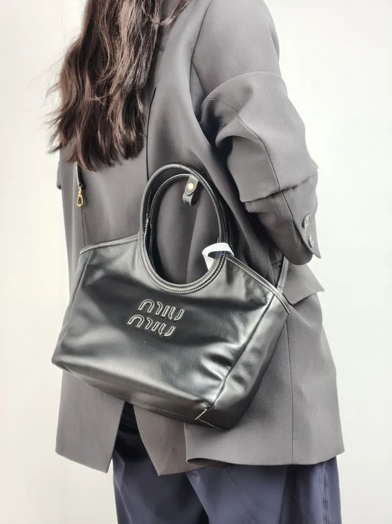 Miumiu Shoulder Bag IVY Tote Shopping Tote Black CC alfskin Small 22 × 12 × 23.5 cm — on-model view 1 of 2