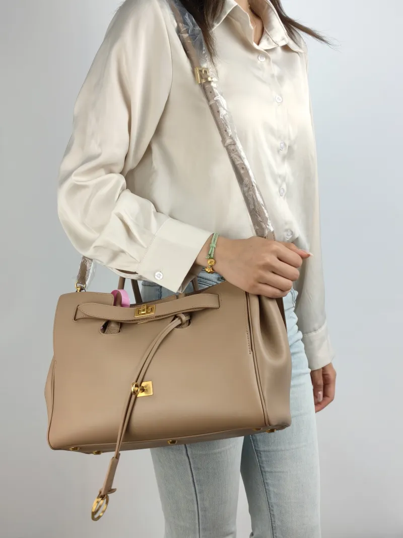 BALENCIAGA Top Handle Bag Bel air Calfskin Small 30 × 12 × 20.5 cm — on-model view 2 of 2