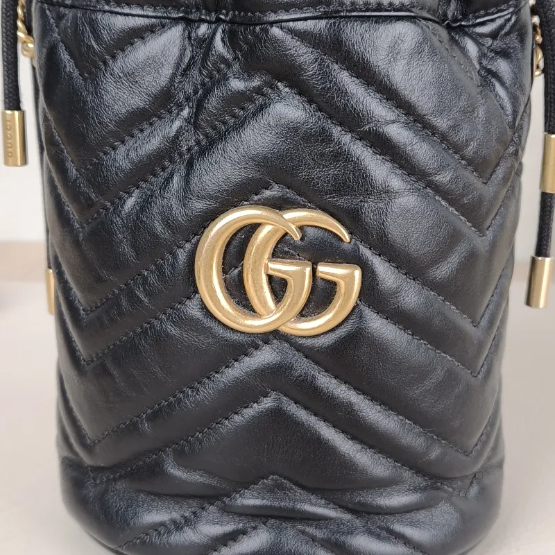 GUCCI Crossbody Bag GG Marmont Marmont Bucket Bag Black with Gold-Tone Hardware Calfskinmini13 × 10 × 17.5 cm — detail view 3 of 11