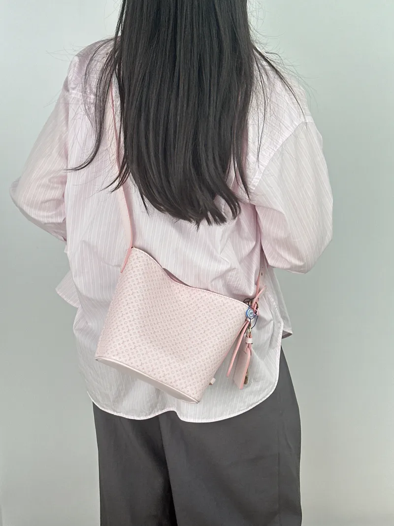 Louis Vuitton Top Handle Bag ALL IN BB Pink Calfskin BB 16 × 12 × 18 cm — on-model view 1 of 2