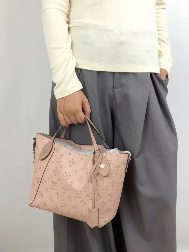 Louis Vuitton Shoulder Bag Hina Pink Calfskin Small 23 × 13 × 21 cm — on-model view 1 of 2