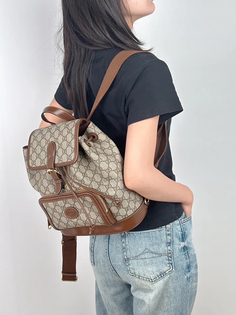 GUCCI Backpack GG Retro Collection Backpack Brown PVC One Size 26.5 × 13 × 30 cm — on-model view 1 of 3