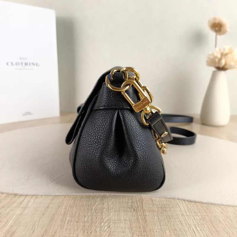Louis Vuitton Crossbody Bag Favorite Black Monogram Empreinte Embossed Calfskin Medium 24 × 9 × 14 cm — detail view 6 of 10
