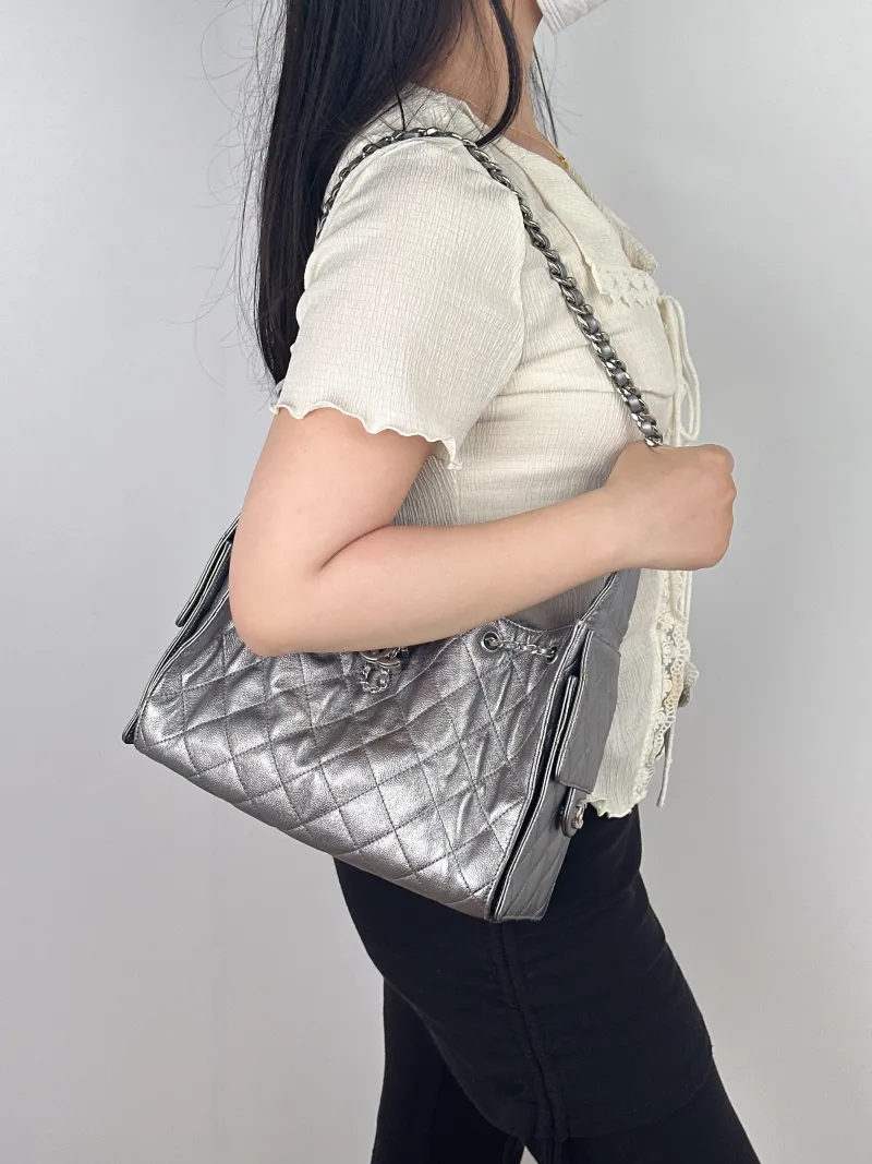 Chanel Shoulder Bag25Bag Silver Calfskin Small26 × 14 × 30 cm — on-model view 1 of 2