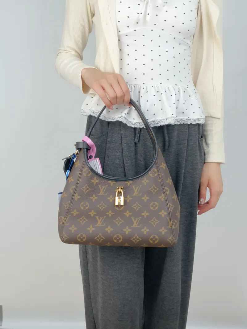 Louis Vuitton Shoulder Bag The Drop Monogram PVC Small28 × 12 × 15 cm — on-model view 2 of 3