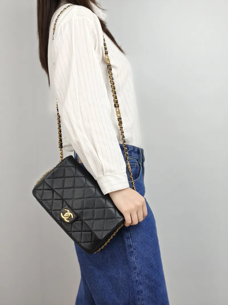 Chanel Crossbody Bag Editioncf mini Black Grained Calfskin 23.5 × 7 × 15 cm — on-model view 1 of 2