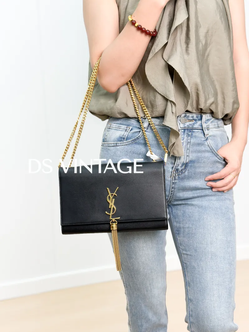 SAINT LAURENT Crossbody Bag KATE Edition Black Calfskin Medium 24 × 5.5 × 14.5 cm — on-model view 2 of 3