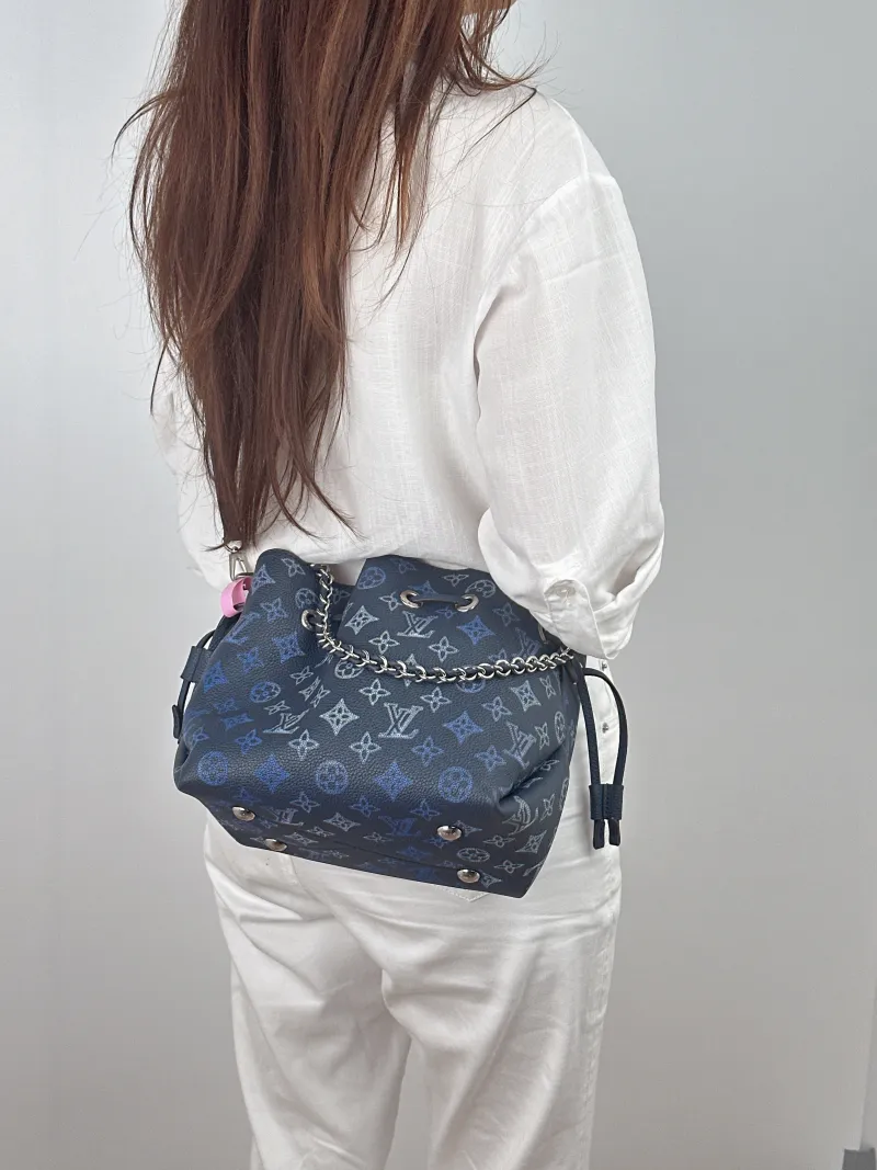 Louis Vuitton Crossbody Bag BELLA · Calfskin One Size 22 × 14 × 19 cm — on-model view 1 of 2