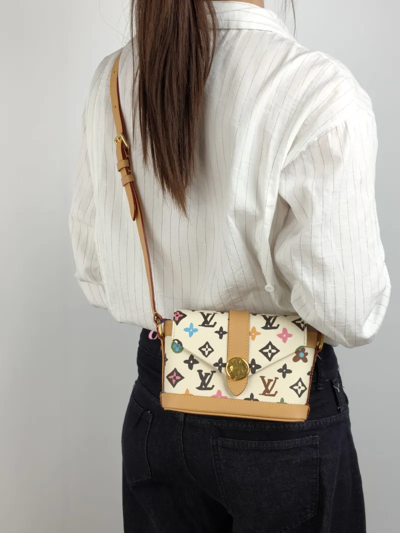 Louis Vuitton Crossbody Bag ENVELOPE Messenger Bag Box Tyler Yellow PVC Mini 19 × 7 × 12 cm — on-model view 1 of 2