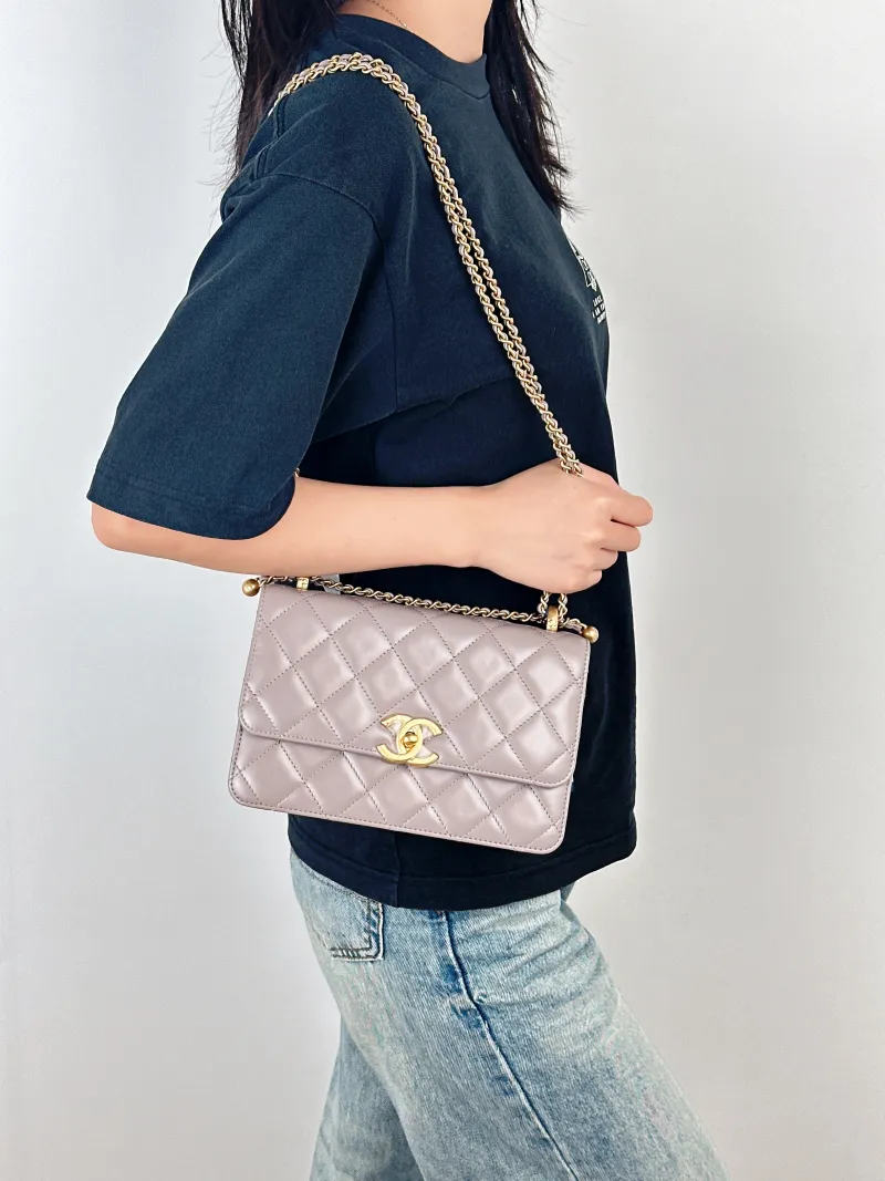 Chanel Crossbody Bag woc Calfskin Medium22 × 8 × 14.5 cm — on-model view 1 of 3