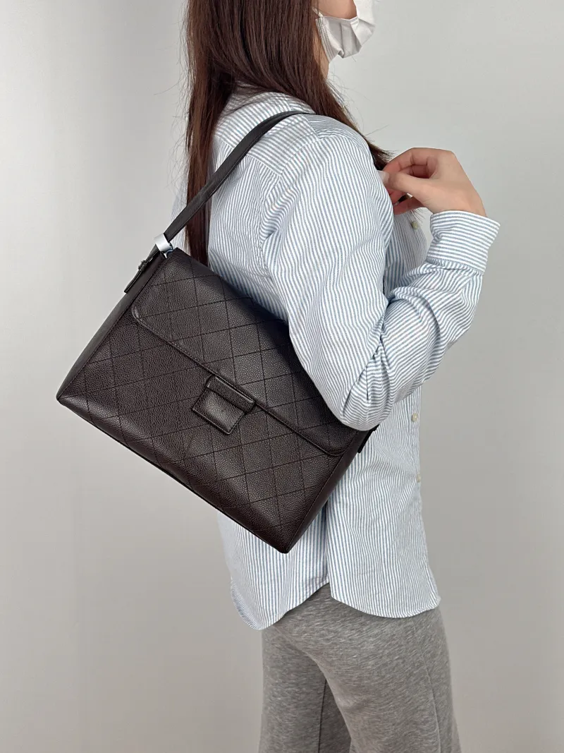 Chanel Shoulder Bag Brown Grained Calfskin One Size30 × 10 × 22 cm — on-model view 2 of 2
