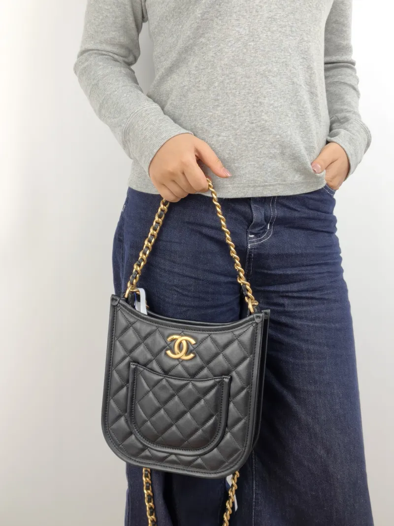 Chanel Crossbody Bag 24s hobo Black Calfskin One Size 22 × 6 × 24 cm — on-model view 1 of 3