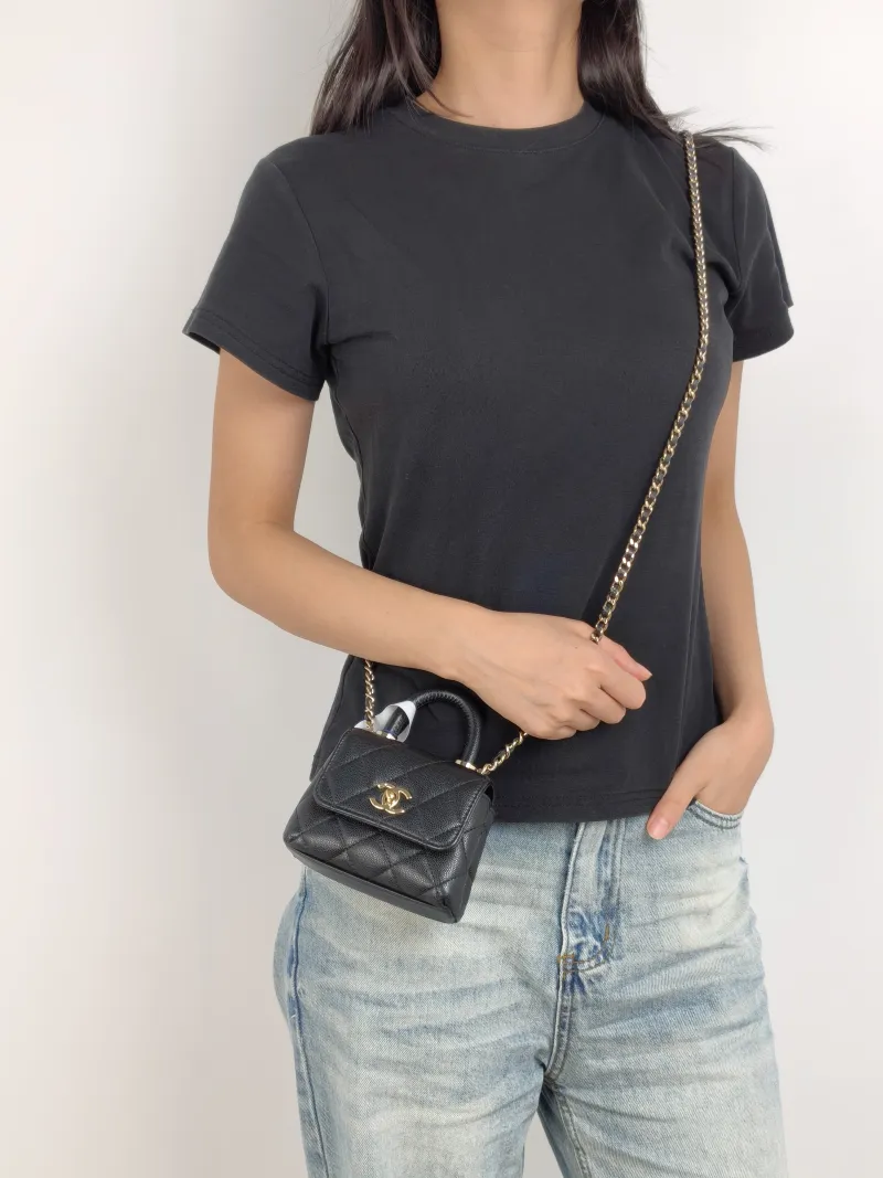 Chanel Top Handle Bag Coco Handle​ Black Grained Calfskin Mini 12 × 4 × 9 cm — on-model view 1 of 3