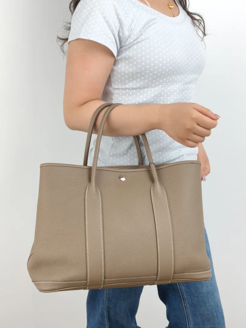 Hermès Top Handle Bag Garden Party 36 36 Negonda Calfskin Large 36 × 17 × 26 cm A — on-model view 2 of 2
