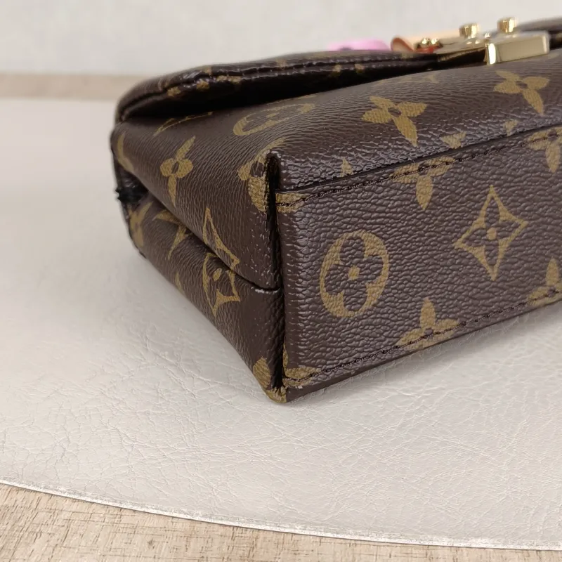 Louis Vuitton Crossbody Bag MADELEINE Monogram PVC nano 21 × 6 × 12.5 cm — detail view 10 of 11