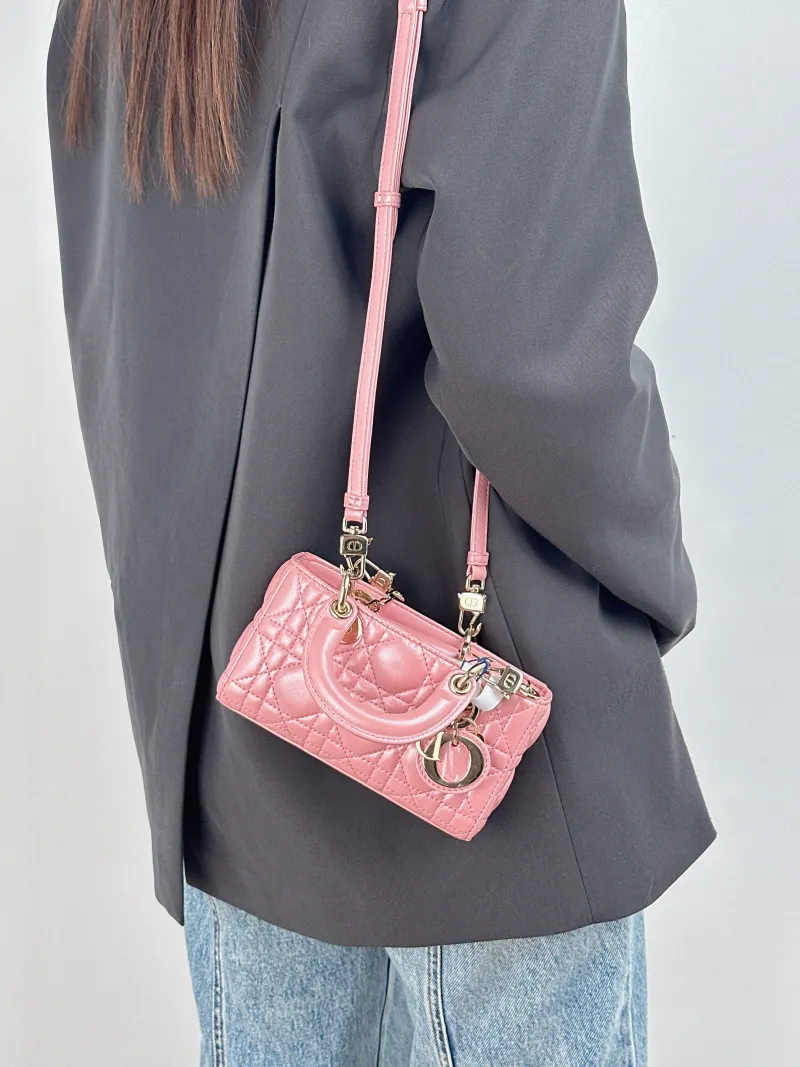 DIOR Crossbody Bag Lady D-Joy Lambskin Mini 16 × 5 × 9 cm — on-model view 1 of 2