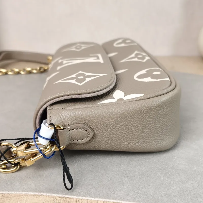 Louis Vuitton Crossbody Bag IVY Empreinte Embossed Calfskin Small 23.5 × 4.3 × 12 cm — detail view 9 of 11