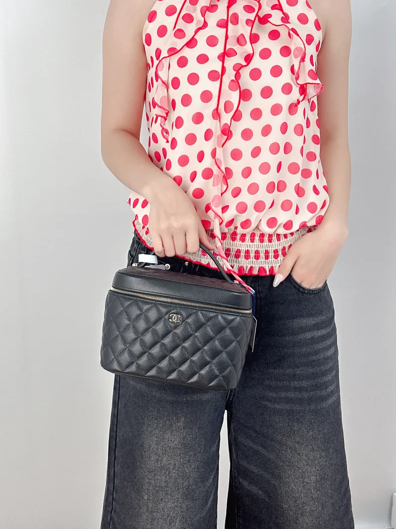Chanel Top Handle Bag 22C Box Bag Cosmetic Bag Black Grained Calfskin 21 × 14 × 15 cm — on-model view 2 of 2