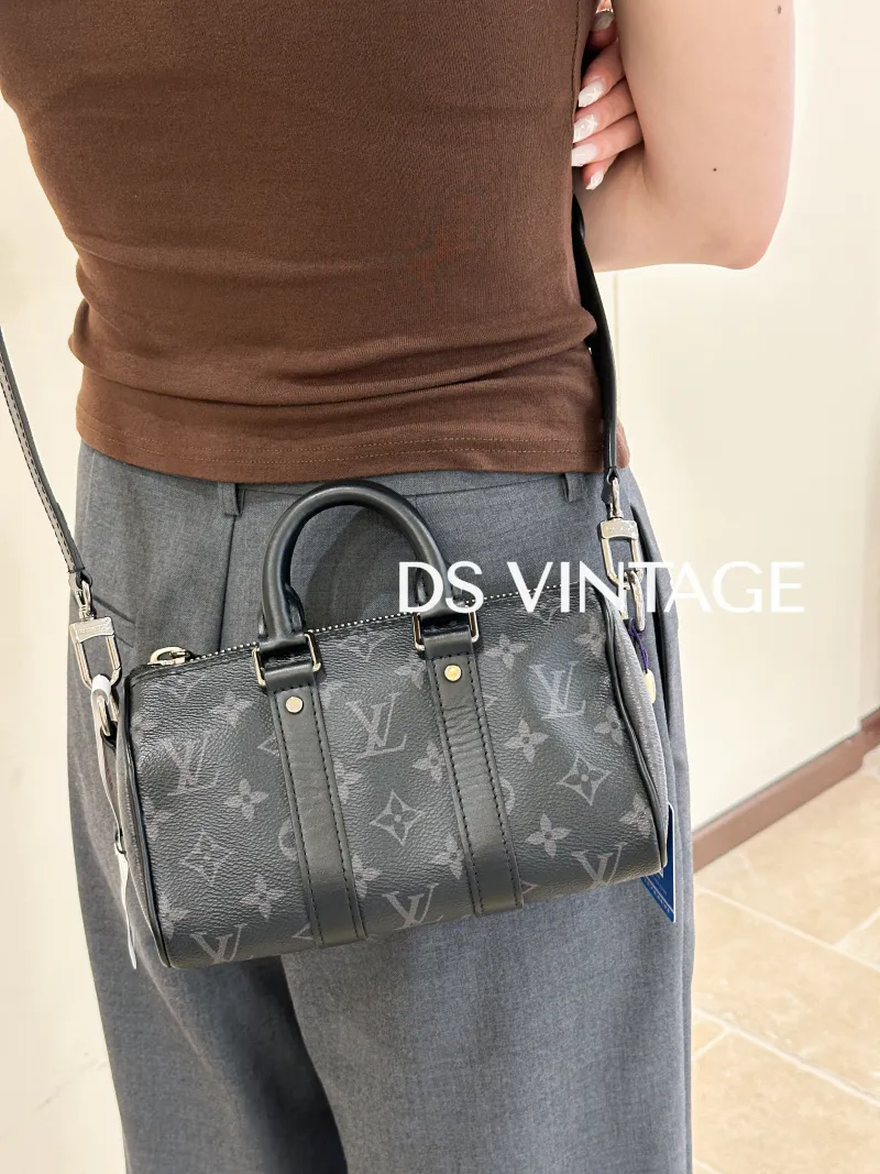 Louis Vuitton Crossbody Bag Keepall XS Monogram PVC Mini 21 × 9 × 12 cm — on-model view 3 of 6