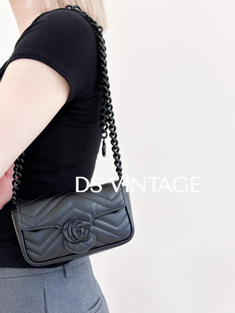GUCCI Crossbody Bag GG Marmont So Black Marmont So Black Black CC alfskin Mini 16.5 × 5 × 10 cm — on-model view 1 of 3