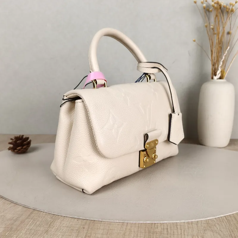Louis Vuitton Crossbody Bag MADELEINE White Monogram Empreinte Embossed Calfskin BB 24 × 8.5 × 17 cm — cover view 5 of 5