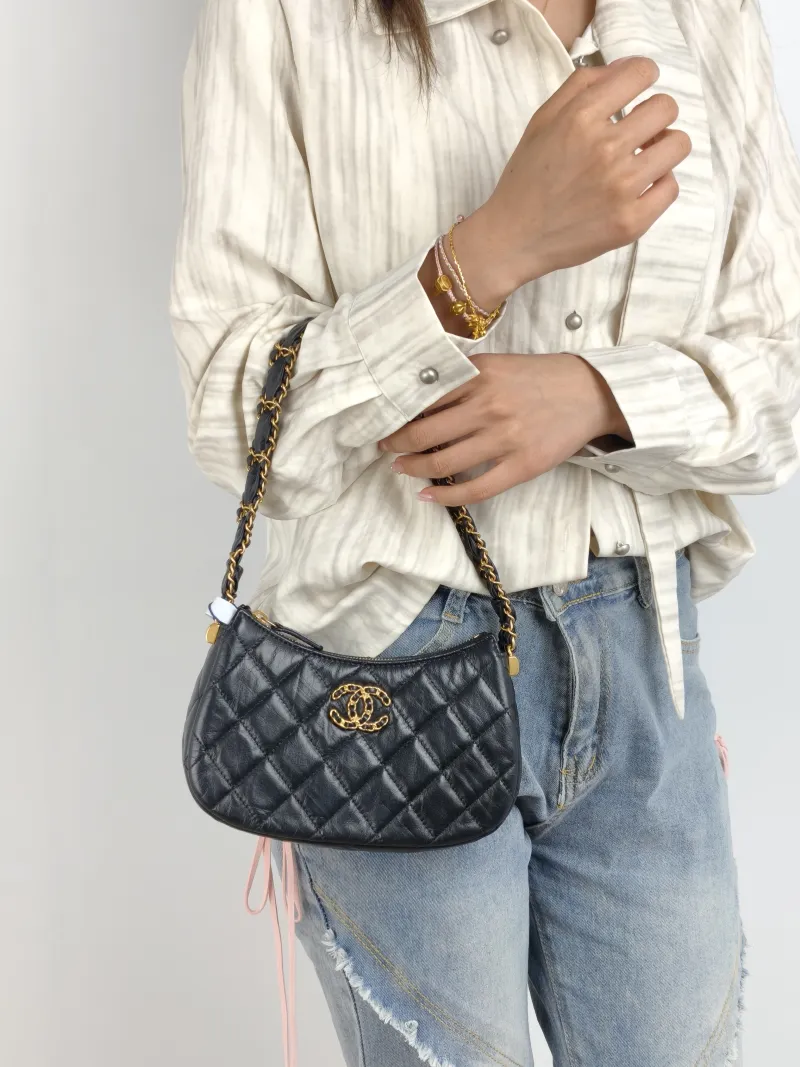 Chanel Shoulder Bag hobo 19 Black Lambskin Small 20 × 4.5 × 13 cm — on-model view 1 of 2