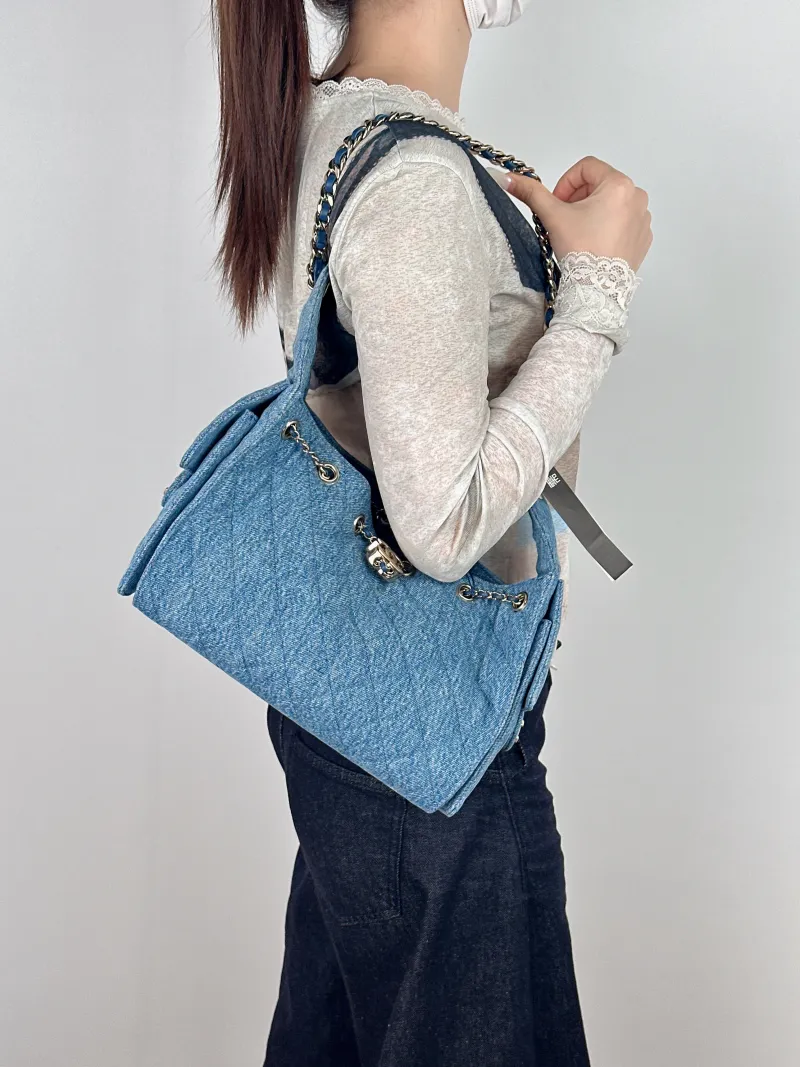 Chanel Shoulder Bag25Bag Blue Small26 × 14 × 30 cm — on-model view 1 of 2
