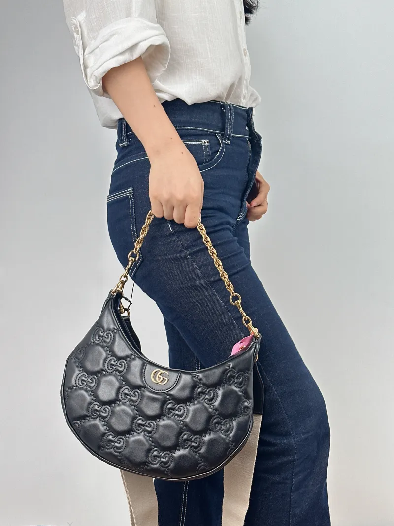 GUCCI Shoulder Bag GG matelasse Black Calfskin Small 27 × 7 × 18 cm — on-model view 2 of 2