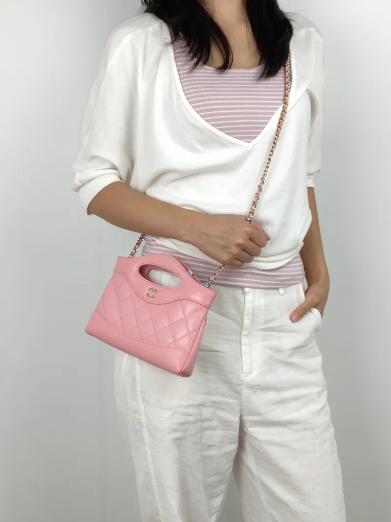 Chanel Crossbody Bag 31Bag Pink Waxed Leather nano 20.5 × 3.5 × 17 cm — on-model view 3 of 3
