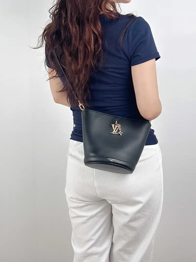 Louis Vuitton Shoulder Bag Bloom Hobo Bucket Bag Black Calfskin Mini 16 × 11 × 17.5 cm — on-model view 2 of 2
