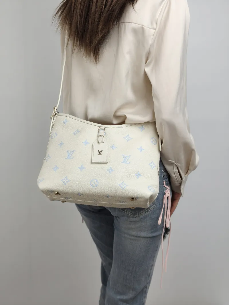 Louis Vuitton Crossbody Bag Carryall White · Blue Calfskin Small 29.5 × 12 × 24 cm — on-model view 2 of 2