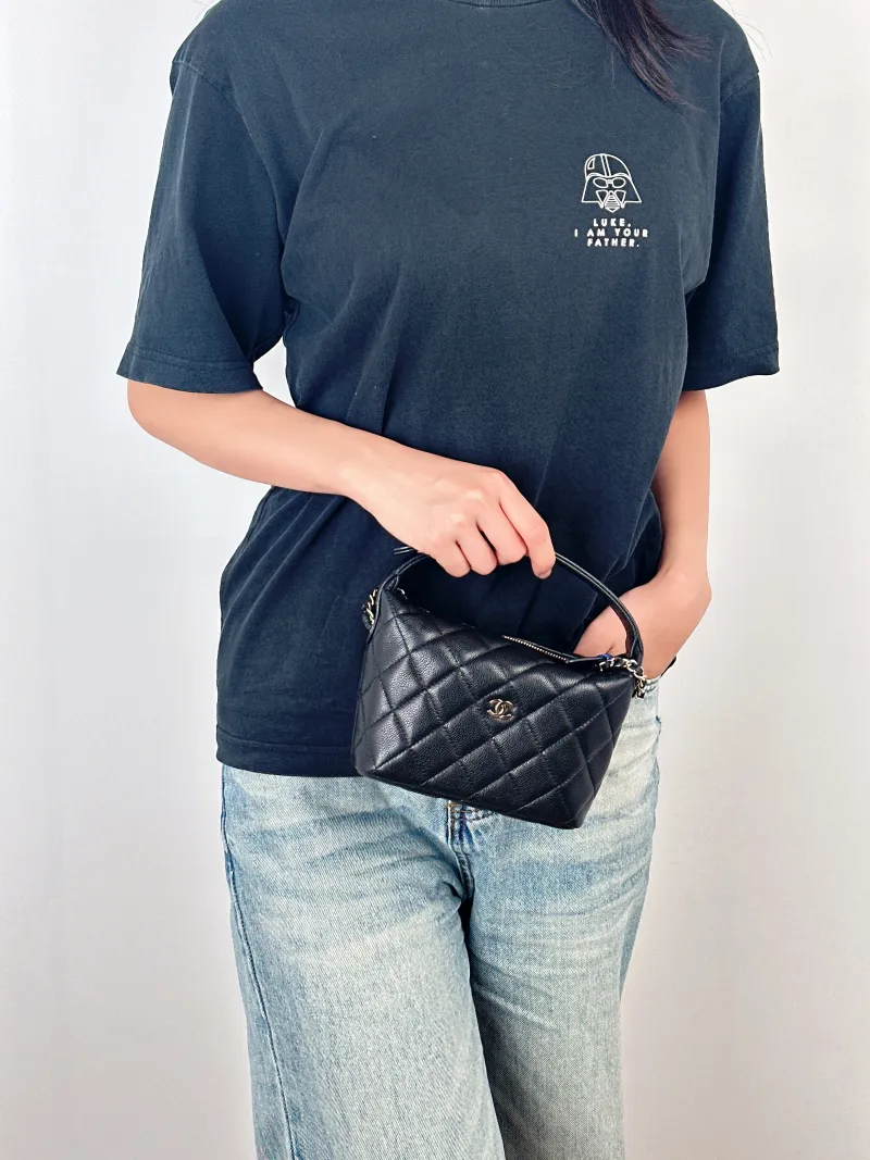 Chanel Crossbody Bag25c Vanity Case Bag Black Grained Calfskin15.5 × 6 × 12 cm — on-model view 1 of 3